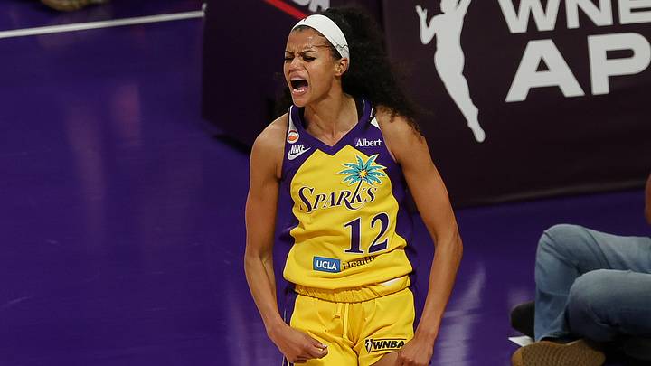 Jun 21, 2026; Los Angeles, California, USA; Los Angeles Sparks guard-forward Rae Burrell (12) celebrates the an one at Crypto.com Arena. Mandatory Credit: William Navarro-Imagn Images Jun 21, 2026; Los Angeles, California, USA; Los Angeles Sparks guard-forward Rae Burrell (12) celebrates the an one at Crypto.com Arena. Mandatory Credit: William Navarro-Imagn Images