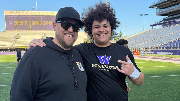 Josiah Eney, show with UW line coach Michael Switzer, was MVP of the Huskies' line camp. Josiah Eney, show with UW line coach Michael Switzer, was MVP of the Huskies' line camp.