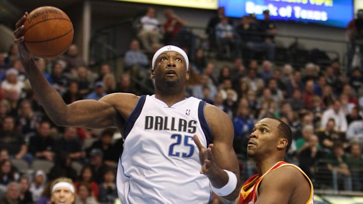 Dec 18, 2009; Dallas, TX, USA; Dallas Mavericks center Erick Dampier (25) with the bal in the post against Houston Rockets center Chuck hayes (44) in the first quarter at American Airlines Arena. Mandatory Credit: Photo By Matthew Emmons-Imagn Images