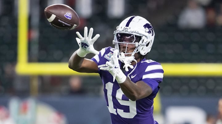 Dec 26, 2024; Phoenix, AZ, USA; Kansas State Wildcats safety VJ Payne (19) against the Rutgers Scarlet Knights during the Rate Bowl at Chase Field. Mandatory Credit: Mark J. Rebilas-Imagn Images