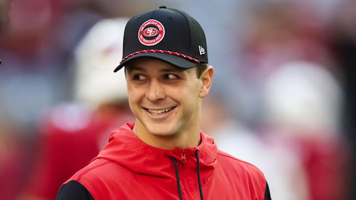 Jan 5, 2025; Glendale, Arizona, USA; San Francisco 49ers injured quarterback Brock Purdy prior to the game against the Arizona Cardinals at State Farm Stadium. Mandatory Credit: Mark J. Rebilas-Imagn Images