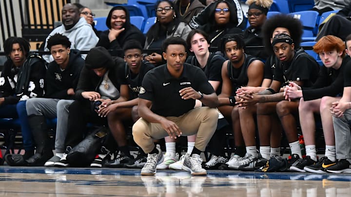 Little Rock Central head coach Shelby Lewis watches his Tigers during Friday's win at Conway. 