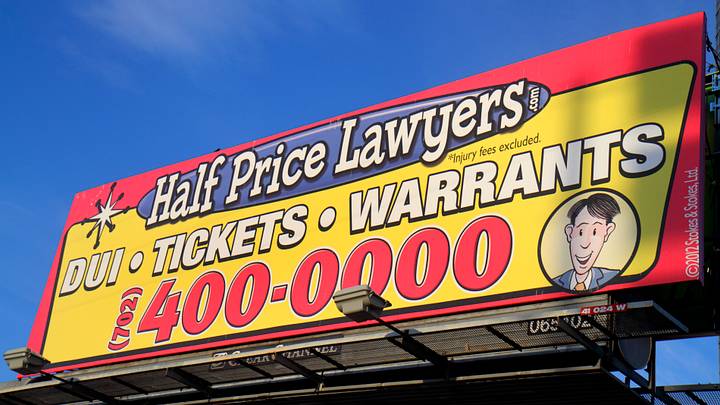 Half Price Lawyers sign. Half Price Lawyers sign.
