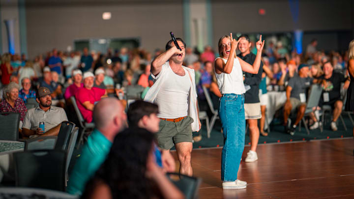 St. Andre Golf's Jonathan Pawlowski and Hannah Aslesen at Myrtle Beach World Am karaoke night.
