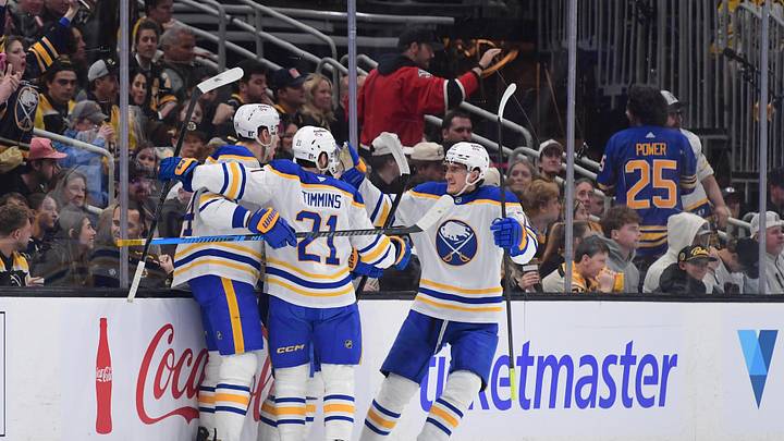 Buffalo Sabres players including defenseman Logan Stanley