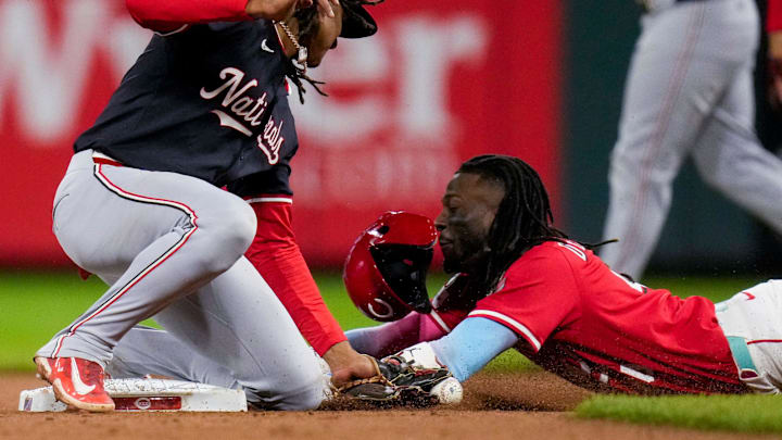 Washington Nationals shortstop CJ Abrams (5) tags out Cincinnati Reds shortstop Elly De La Cruz (44) as he attempts to steal second base in the seventh inning of the MLB National League game between the Cincinnati Reds and the Washington Nationals at Great American Ball Park in downtown Cincinnati on Saturday, May 3, 2025. The Nationals won the second game of the series, 11-6.