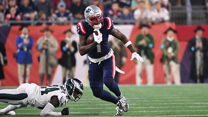 Aug 15, 2024; Foxborough, MA, USA; New England Patriots wide receiver Ja'Lynn Polk (1)  runs the ball against the Philadelphia Eagles during the first half at Gillette Stadium. Mandatory Credit: Eric Canha-Imagn Images