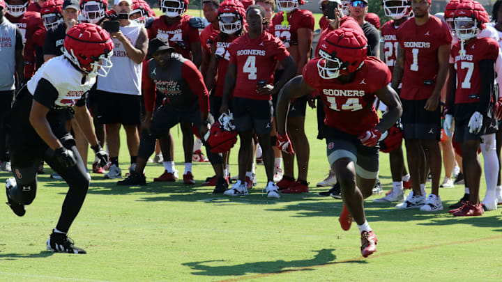 Oklahoma receiver Elijah Thomas battles through a one-on-one rep during fall camp.