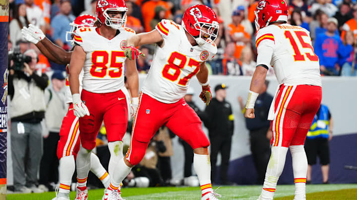 Nov 16, 2025; Denver, Colorado, USA; Kansas City Chiefs tight end Travis Kelce (87) celebrates his touchdown with quarterback Patrick Mahomes (15) and tight end Robert Tonyan (85) in the fourth quarter at Empower Field at Mile High. Mandatory Credit: Ron Chenoy-Imagn Images Nov 16, 2025; Denver, Colorado, USA; Kansas City Chiefs tight end Travis Kelce (87) celebrates his touchdown with quarterback Patrick Mahomes (15) and tight end Robert Tonyan (85) in the fourth quarter at Empower Field at Mile High. Mandatory Credit: Ron Chenoy-Imagn Images