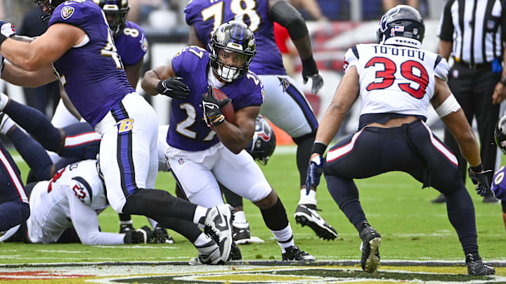 Sep 10, 2023; Baltimore, Maryland, USA; Baltimore Ravens running back J.K. Dobbins (27) carries the ball against the Houston Texans during the first half at M&T Bank Stadium. Mandatory Credit: Brad Mills-USA TODAY Sports
