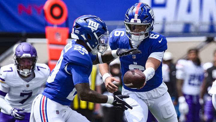 Aug 15, 2026; East Rutherford, New Jersey, USA; New York Giants quarterback Jaxson Dart (6) hands the ball off to running back Tyrone Tracy Jr. (29) during the first half against the Minnesota Vikings at MetLife Stadium.  