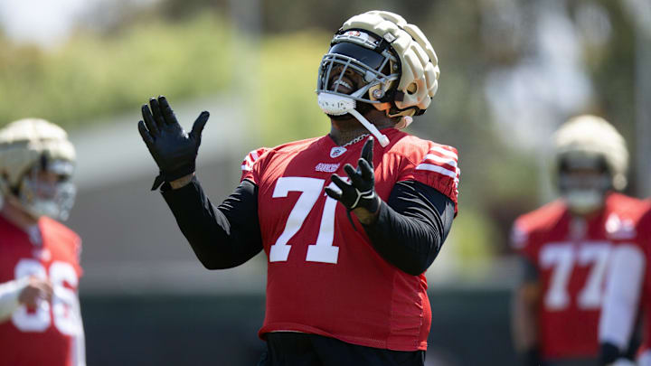 Jun 10, 2025; Santa Clara, CA, USA; San Francisco 49ers offensive tackle Trent Williams (71) reacts to a blocking drill during an OTA at Levi's Stadium. Mandatory Credit: D. Ross Cameron-Imagn Images Jun 10, 2025; Santa Clara, CA, USA; San Francisco 49ers offensive tackle Trent Williams (71) reacts to a blocking drill during an OTA at Levi's Stadium. Mandatory Credit: D. Ross Cameron-Imagn Images