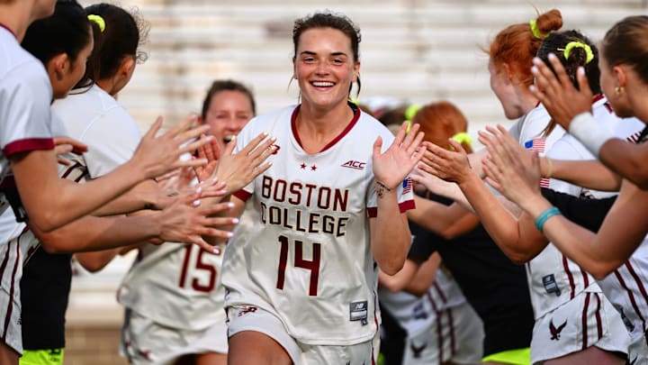 Shea Baker runs out during the starting lineup announcement at Alumni Stadium on April 16, 2026.