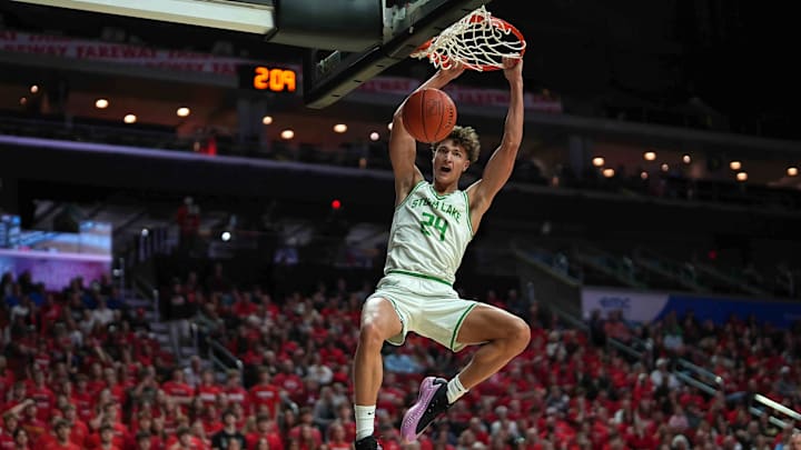 Storm Lake junior Jaidyn Coon dunks the basketball against ADM during the Iowa high school boys state basketball tournament on Monday, March 10, 2025, at Wells Fargo Arena in Des Moines. Mandatory Credit: Bryon Houlgrave-The Des Moines Register