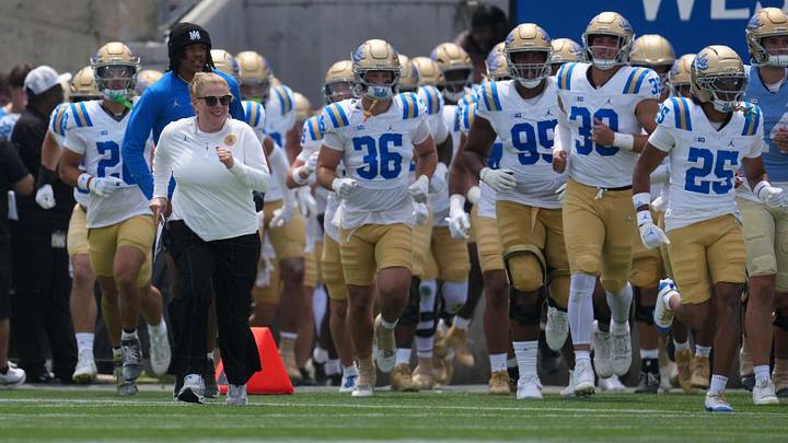 May 2, 2026; Pasadena, CA, USA; UCLA Bruins women's basketball coach Cori Close leads players onto the field during the spring game at Rose Bowl. Mandatory Credit: Kirby Lee-Imagn Images May 2, 2026; Pasadena, CA, USA; UCLA Bruins women's basketball coach Cori Close leads players onto the field during the spring game at Rose Bowl. Mandatory Credit: Kirby Lee-Imagn Images