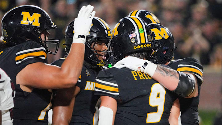 Missouri Tigers quarterback Beau Pribula (9) celebrates after running in for a two point conversion, in a game against the South Carolina Gamecocks this season.