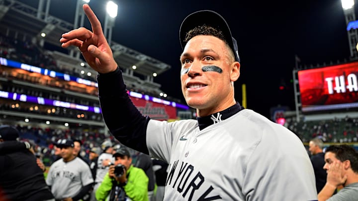 Oct 19, 2024; Cleveland, Ohio, USA; New York Yankees outfielder Aaron Judge (99) celebrates after beating the Cleveland Guardians during game five of the ALCS for the 2024 MLB playoffs at Progressive Field. Mandatory Credit: David Dermer-Imagn Images