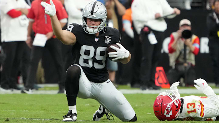 Oct 27, 2024; Paradise, Nevada, USA; Las Vegas Raiders tight end Brock Bowers (89) gestures after a first down against Kansas City Chiefs safety Nazeeh Johnson (13) in the first half at Allegiant Stadium. Mandatory Credit: Kirby Lee-Imagn Images