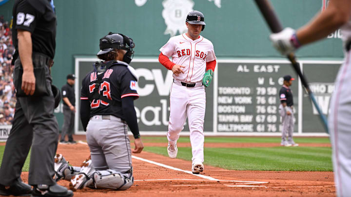 Sep 1, 2025; Boston, Massachusetts, USA; Boston Red Sox third baseman Alex Bregman (2) scores on an RBI by second baseman Romy Gonzalez (23) (not pictured)  during the first inning against the Cleveland Guardians at Fenway Park. Mandatory Credit: Eric Canha-Imagn Images