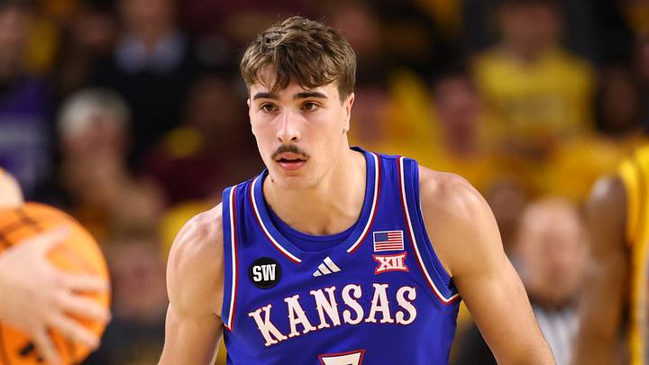 Mar 3, 2026; Tempe, Arizona, USA; Kansas Jayhawks guard Kohl Rosario (7) against the Arizona State Sun Devils at Desert Financial Arena. Mandatory Credit: Mark J. Rebilas-Imagn Images