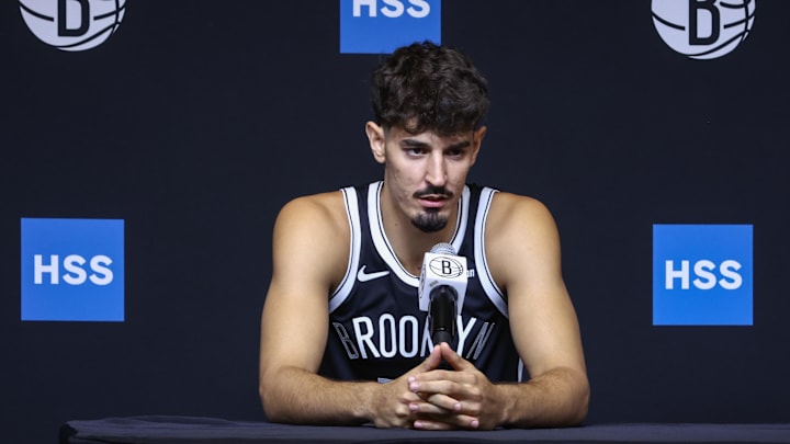 Sep 23, 2025; Brooklyn, NY, USA;  Brooklyn Nets guard Ben Saraf (77) speaks at Media Day. Mandatory Credit: Wendell Cruz-Imagn Images