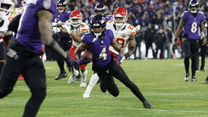 Jan 28, 2024; Baltimore, Maryland, USA; Baltimore Ravens wide receiver Zay Flowers (4) carries the ball against the Kansas City Chiefs during the second half in the AFC Championship football game at M&T Bank Stadium. Mandatory Credit: Geoff Burke-Imagn Images Jan 28, 2024; Baltimore, Maryland, USA; Baltimore Ravens wide receiver Zay Flowers (4) carries the ball against the Kansas City Chiefs during the second half in the AFC Championship football game at M&T Bank Stadium. Mandatory Credit: Geoff Burke-Imagn Images