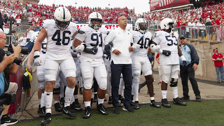 Sep 4, 2021; Madison, Wisconsin, USA;  Penn State Nittany Lions head coach James Franklin stands with the team before taking the field prior to the game against the Wisconsin Badgers at Camp Randall Stadium.