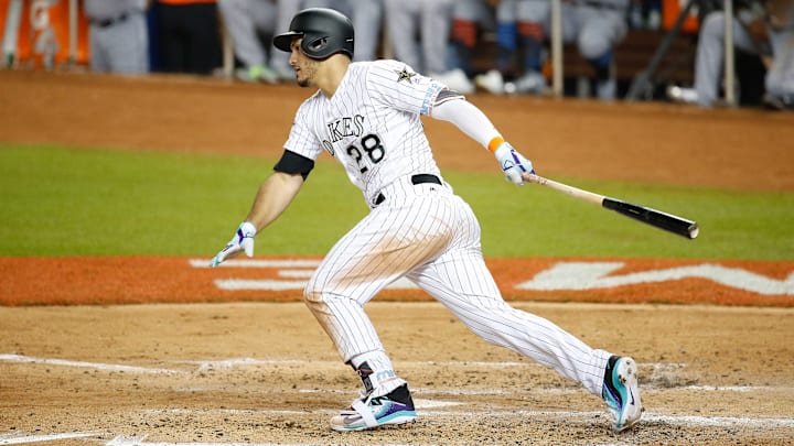 Jul 11, 2017; Miami, FL, USA; Colorado Rockies third baseman Nolan Arenado (28) singles during the 2017 MLB All-Star Game at Marlins Park. Mandatory Credit: Kim Klement-Imagn Images