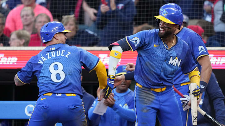Aug 9, 2024; Minneapolis, Minnesota, USA; Minnesota Twins catcher Christian Vazquez (8) and shortstop Willi Castro (50) celebrate during the second inning against the Cleveland Guardians at Target Field. Mandatory Credit: Jordan Johnson-USA TODAY Sports