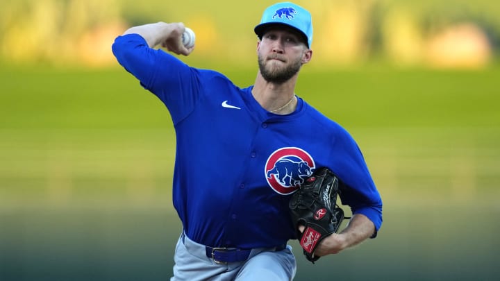 Mar 5, 2024; Surprise, Arizona, USA; Chicago Cubs starting pitcher Caleb Kilian (45) pitches against the Kansas City Royals during the first inning at Surprise Stadium.