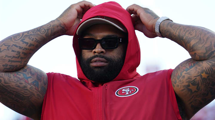 San Francisco 49ers offensive lineman Trent Williams (71) watches from the sideline in the first quarter against the Denver Broncos at Levi's Stadium.