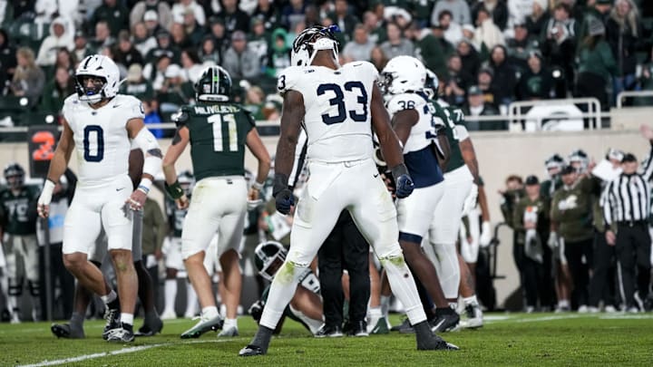 Penn State defensive end Dani Dennis-Sutton (33) celebrates a sack against Michigan State Spartans quarterback Alessio Milivojevic (11) in the fourth quarter at Spartan Stadium. 