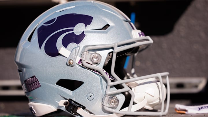 Nov 15, 2025; Stillwater, Oklahoma, USA; Kansas State Wildcats helmet on the side lines prior to the game against the Oklahoma State Cowboys at Boone Pickens Stadium. Nov 15, 2025; Stillwater, Oklahoma, USA; Kansas State Wildcats helmet on the side lines prior to the game against the Oklahoma State Cowboys at Boone Pickens Stadium.