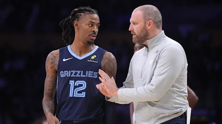 Dec 15, 2024; Los Angeles, California, USA; Memphis Grizzlies coach Taylor Jenkins (right) talks with guard Ja Morant (12) against the Los Angeles Lakers at Crypto.com Arena. Mandatory Credit: Kirby Lee-Imagn Images