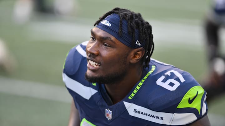 Aug 10, 2023; Seattle, Washington, USA; Seattle Seahawks offensive tackle Charles Cross (67) during warmups prior to the game at Lumen Field.