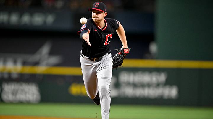 Aug 23, 2025: Cleveland Guardians first baseman Kyle Manzardo (9) tosses the ball to first base during the game against the Texas Rangers at Globe Life Field. Credit: Jerome Miron-Imagn Images