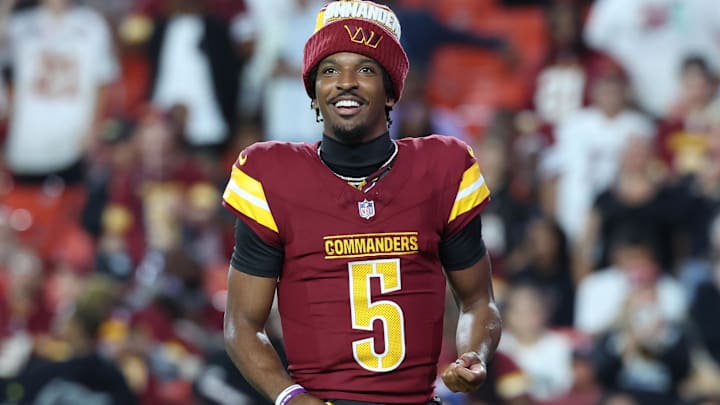 Washington Commanders quarterback Jayden Daniels (5) request the ball after Commanders running back Jacory Croskey-Merritt (not pictured) scores a touchdown against Cincinnati Bengals during the first half at Northwest Stadium. Washington Commanders quarterback Jayden Daniels (5) request the ball after Commanders running back Jacory Croskey-Merritt (not pictured) scores a touchdown against Cincinnati Bengals during the first half at Northwest Stadium.