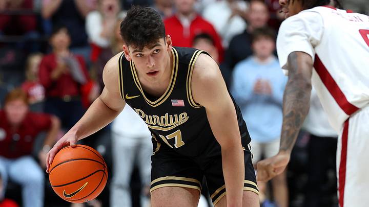 Purdue Boilermakers guard Omer Mayer (17) dribbles against Alabama Crimson Tide guard Labaron Philon (0).