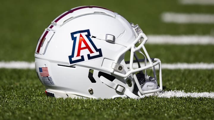 Nov 25, 2022; Tucson, Arizona, USA; Detailed view of an Arizona Wildcats helmet on the field during the Territorial Cup at Arizona Stadium. Mandatory Credit: Mark J. Rebilas-Imagn Images