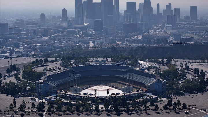 Oct 26, 2025; Los Angeles, California, USA; A general overall view of Dodger Stadium and the downtown skyline. Mandatory Credit: Kirby Lee-Imagn Images