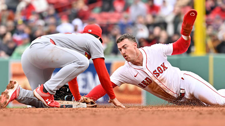 Apr 6, 2025; Boston, Massachusetts, USA; Boston Red Sox second baseman Romy Gonzalez (23) is tagged out at second base by St. Louis Cardinals second baseman Thomas Saggese (25) during the seventh inning at Fenway Park. Mandatory Credit: Eric Canha-Imagn Images Apr 6, 2025; Boston, Massachusetts, USA; Boston Red Sox second baseman Romy Gonzalez (23) is tagged out at second base by St. Louis Cardinals second baseman Thomas Saggese (25) during the seventh inning at Fenway Park. Mandatory Credit: Eric Canha-Imagn Images