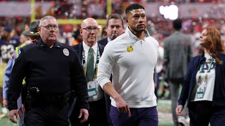Jan 20, 2025; Atlanta, GA, USA; Notre Dame Fighting Irish head coach Marcus Freeman reacts after losing against the Ohio State Buckeyes in the CFP National Championship college football game at Mercedes-Benz Stadium. 