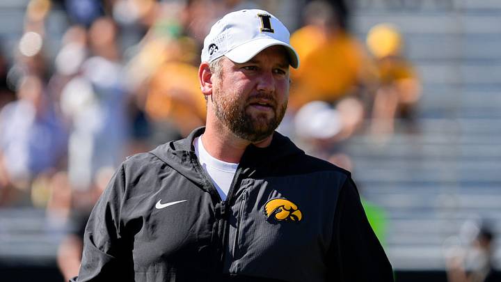 Iowa Hawkeyes Wide Receivers coach Jon Budmayr watches warmups before a football game against the Indiana Hoosiers Sept. 27, 2025 at Kinnick Stadium in Iowa City, Iowa. Iowa Hawkeyes Wide Receivers coach Jon Budmayr watches warmups before a football game against the Indiana Hoosiers Sept. 27, 2025 at Kinnick Stadium in Iowa City, Iowa.