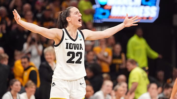 Iowa Hawkeyes guard Caitlin Clark (22) celebrates in the final seconds of a second-round NCAA Tournament game between Iowa and West Virginia, Monday, March 25, 2024 at Carver Hawkeye Arena in Iowa City.