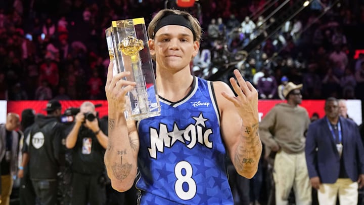 Feb 15, 2025; San Francisco, CA, USA; Osceola Magic guard Mac McClung celebrates with the trophy after winning the slam dunk competition during All Star Saturday Night ahead of the 2025 NBA All Star Game at Chase Center. Mandatory Credit: Kyle Terada-Imagn Images