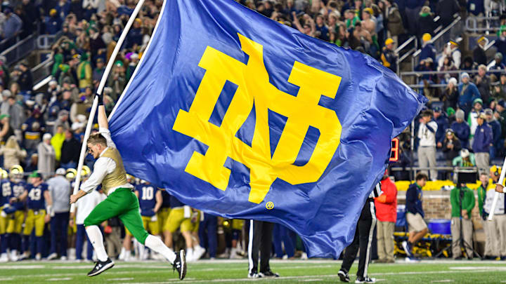 Oct 23, 2021; South Bend, Indiana, USA; The Notre Dame Leprechaun carries a Notre Dame monogram flag after a Notre Dame touchdown in the fourth quarter against the USC Trojans at Notre Dame Stadium. 