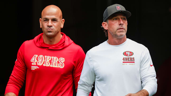 Sep 7, 2025; Seattle, Washington, USA; San Francisco 49ers defensive coordinator Robert Saleh, left, and head coach Kyle Shanahan, right, exit the locker room during pregame warmups against the Seattle Seahawks at Lumen Field. Mandatory Credit: Joe Nicholson-Imagn Images