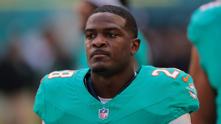 Dec 28, 2025; Miami Gardens, Florida, USA; Miami Dolphins running back De'Von Achane (28) warms up before a game against the Tampa Bay Buccaneers at Hard Rock Stadium. Mandatory Credit: Sam Navarro-Imagn Images