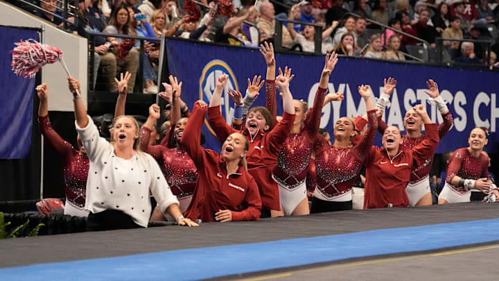 Mar 22, 2025; Birmingham AL, USA; Alabama gymnasts cheer a teammate on the vault in Sesssion 1 of the SEC Gymnastics Tournament at Legacy Arena. Mar 22, 2025; Birmingham AL, USA; Alabama gymnasts cheer a teammate on the vault in Sesssion 1 of the SEC Gymnastics Tournament at Legacy Arena.