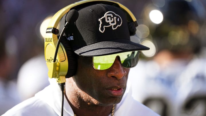 Colorado Buffaloes head coach Deion Sanders walks the sidelines as his team takes on the ASU Sun Devils at Mountain America Stadium in Tempe on Oct. 7, 2023.